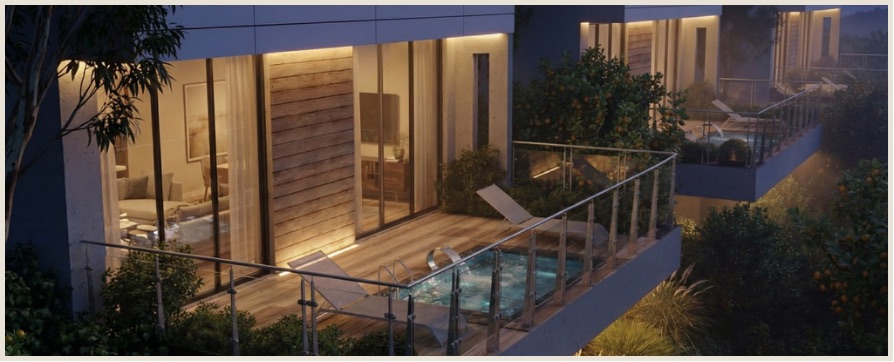 Evening view of a villa terrace with private pool